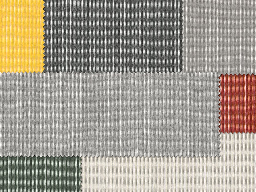 Stoftextuur met rechthoekige vlakken in geel, grijs, zwart, groen en rood. Stoftextuur met rechthoekige vlakken in geel, grijs, zwart, groen en rood.